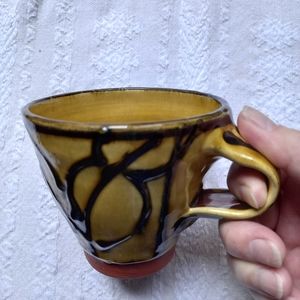 Unique artisan handmade coffee cup